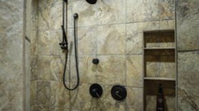 Shower head and controls, done by Complete Home Care, a bathroom remodeling company in Boca Raton, FL.